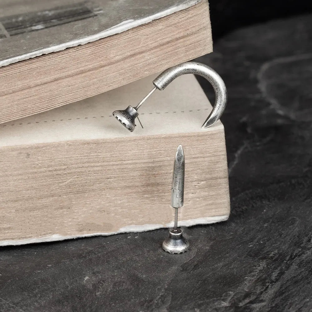 S925 sterling silver nail-shaped stud earrings in straight and curved punk designs