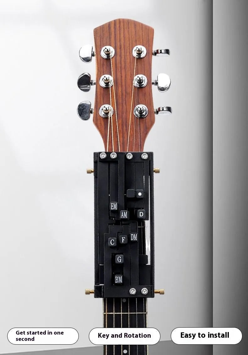 Black automatic chord changing device mounted on folk guitar neck for novice practice