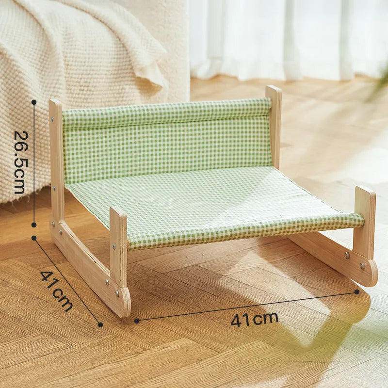 Wooden elevated cat bed with cloth hammock in beach chair design for indoor use