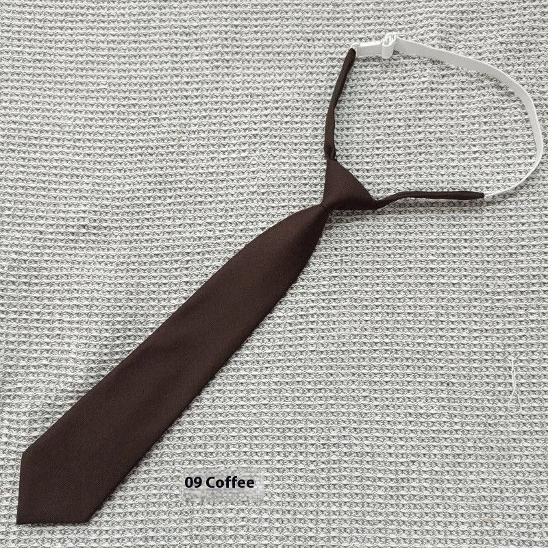 Men's navy blue cotton bow tie with arrow style design and solid colour