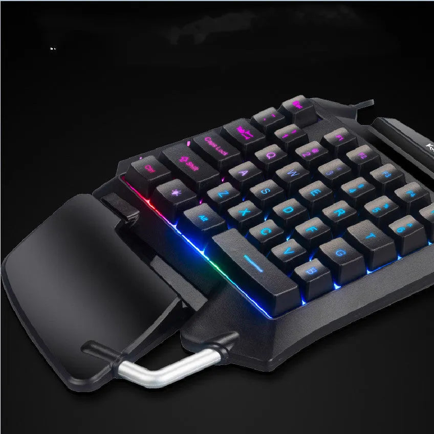 Black one-handed left-hand gaming keyboard with wrist rest and USB connection