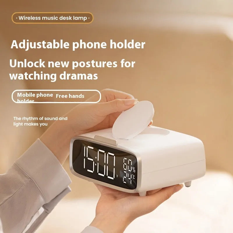 White wireless charger with Bluetooth speaker and night lamp functions showing Qi charging surface