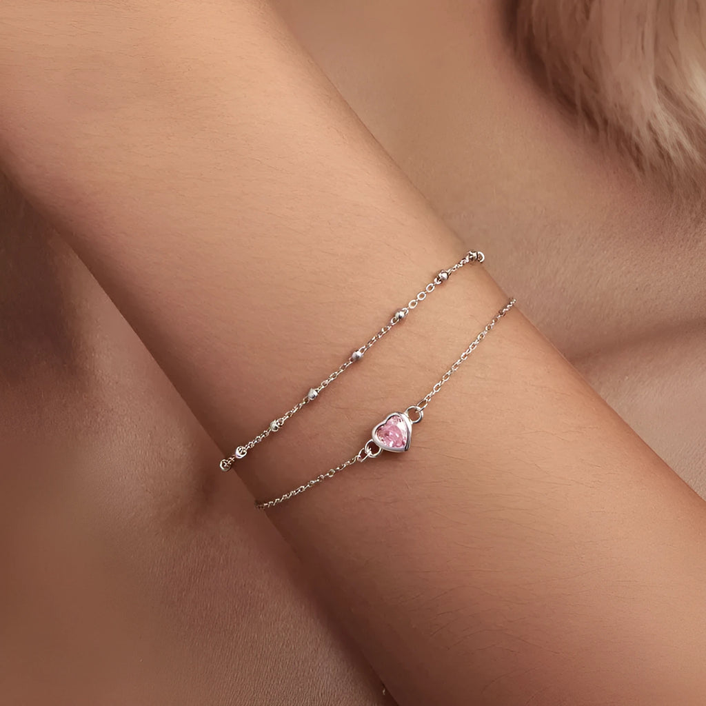 Women's sweet style 925 sterling silver bracelet with a small heart-shaped pendant on an adjustable chain.