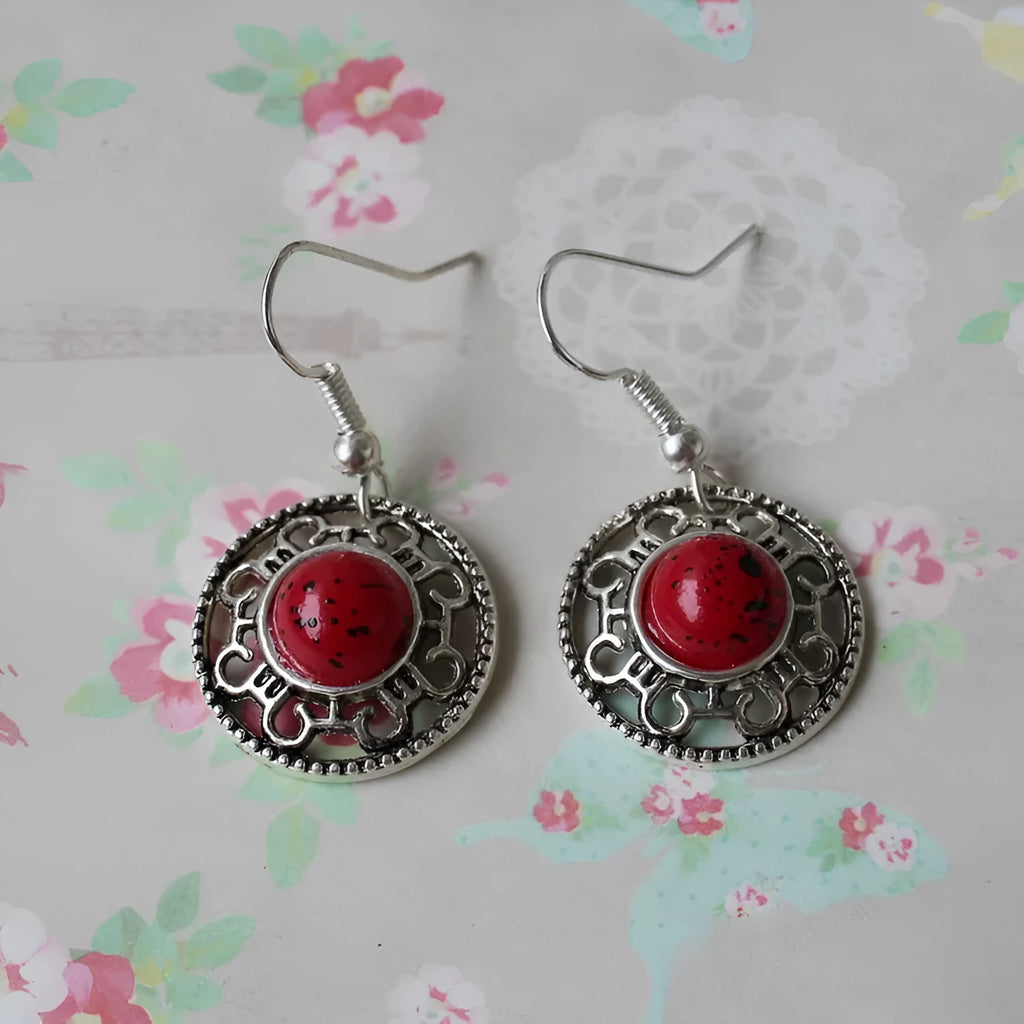 Ethnic Miao silver earrings with turquoise flower disk and geometric auspicious patterns