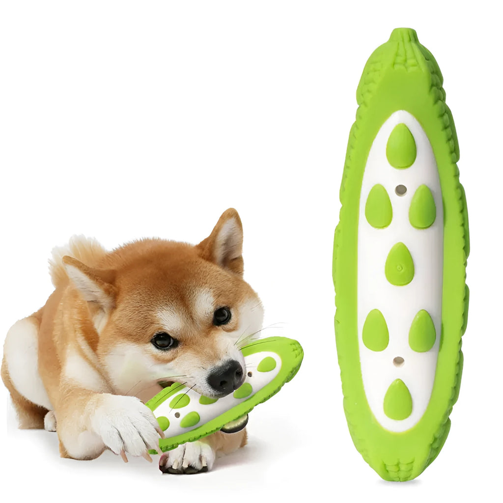 Green durable rubber dog chew toy with meat scent simulation for large breed biting resistance