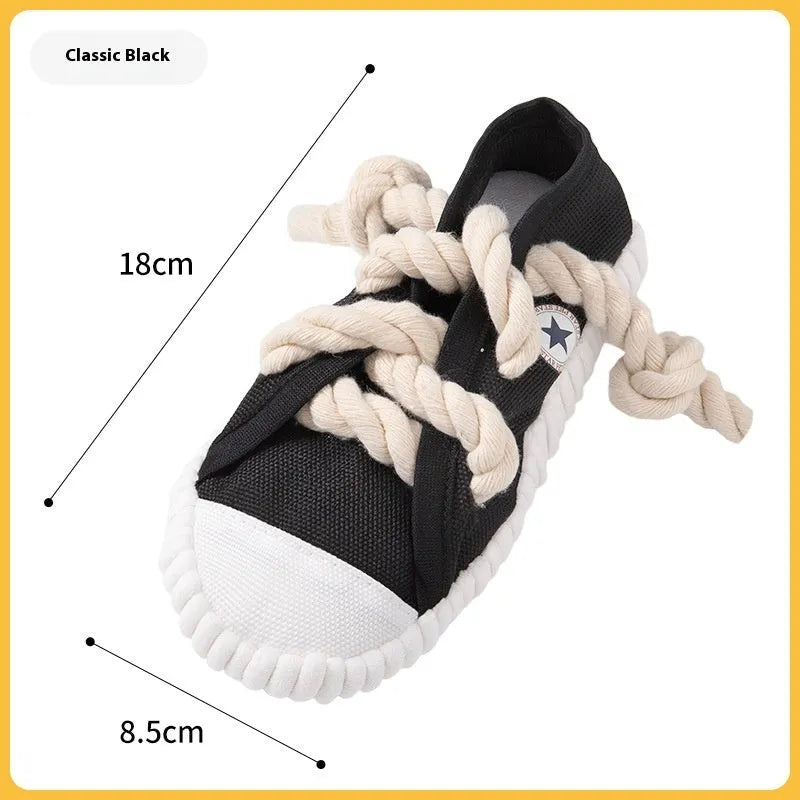 Plastic dog chew toy with sound squeaker in bendable slipper design for dental care