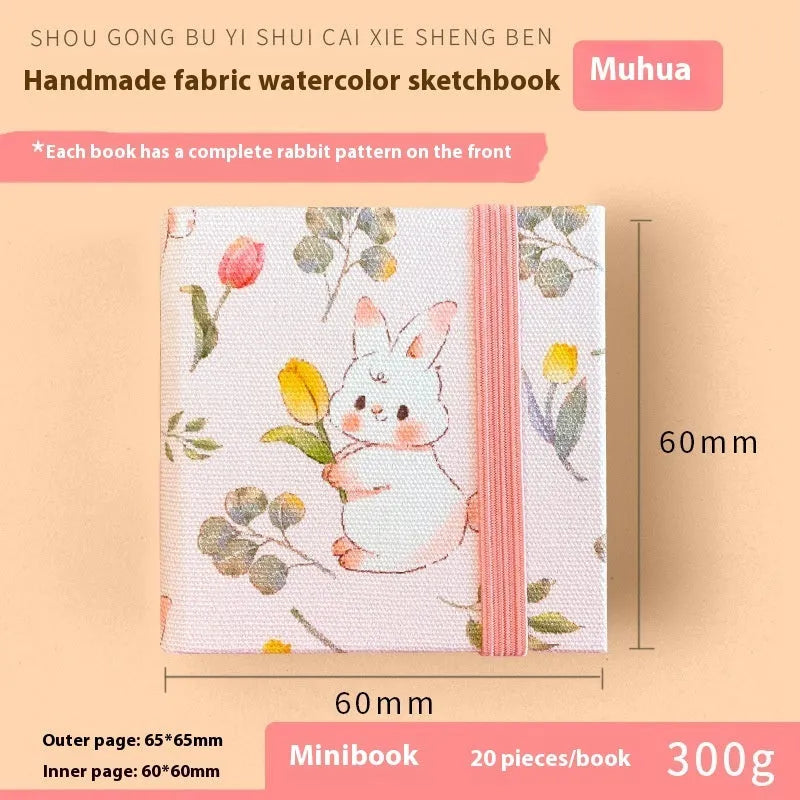 Feiluniao handmade fabric watercolour sketchbook with decorative cover, shown at 185mm length.