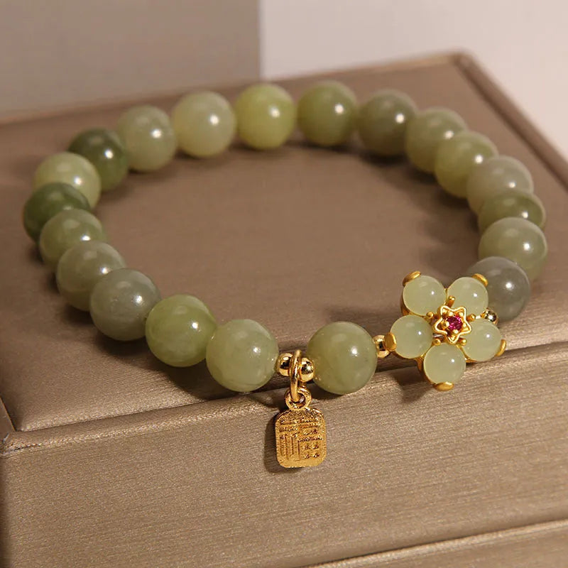 Women's casual bracelet in grey jade colour made from alloy material.