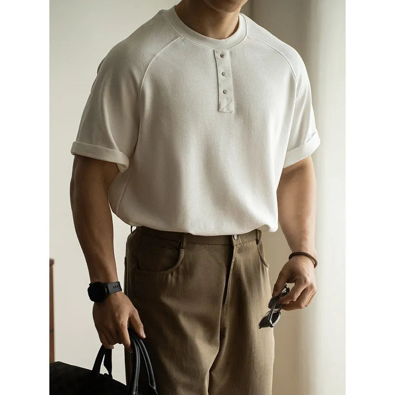 Casual loose top with raglan sleeves in terry texture fabric, shown in neutral colours