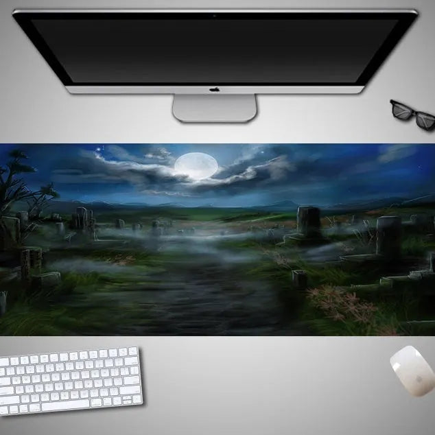 Oversized Halloween-themed rubber cloth mouse pad with non-slip base on a desk.