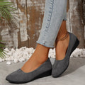 Women's suede wedge pumps in light brown with pointed toe and shallow mouth design.