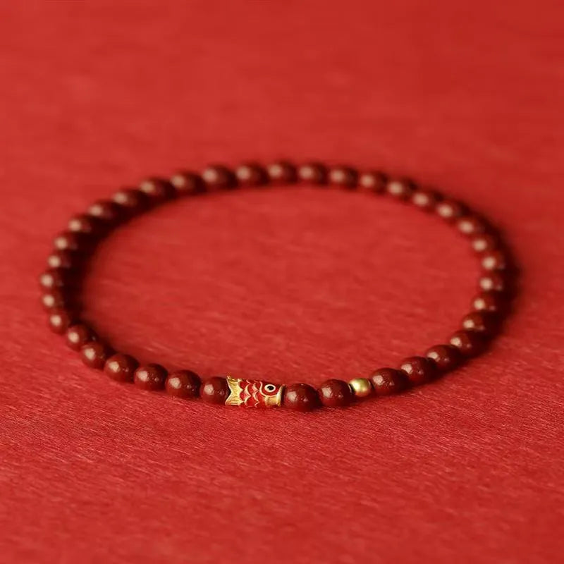 Natural raw ore cinnabar koi bracelet with golden ball model in national style