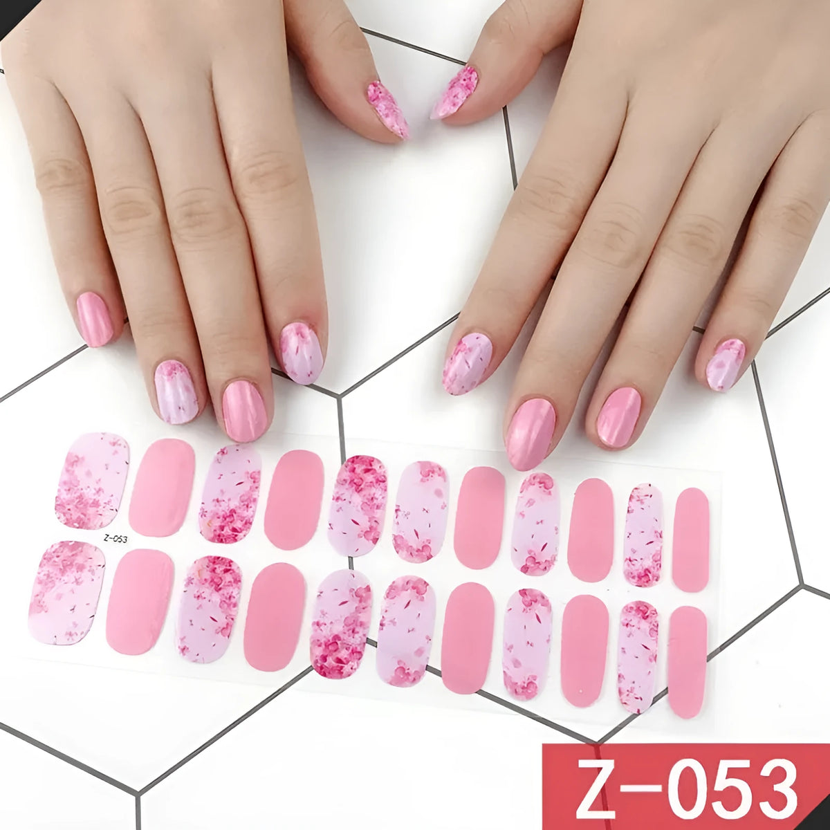 Pack of Korean nail art stickers showing cartoon, strawberry, flower, and bow designs with a nail file.