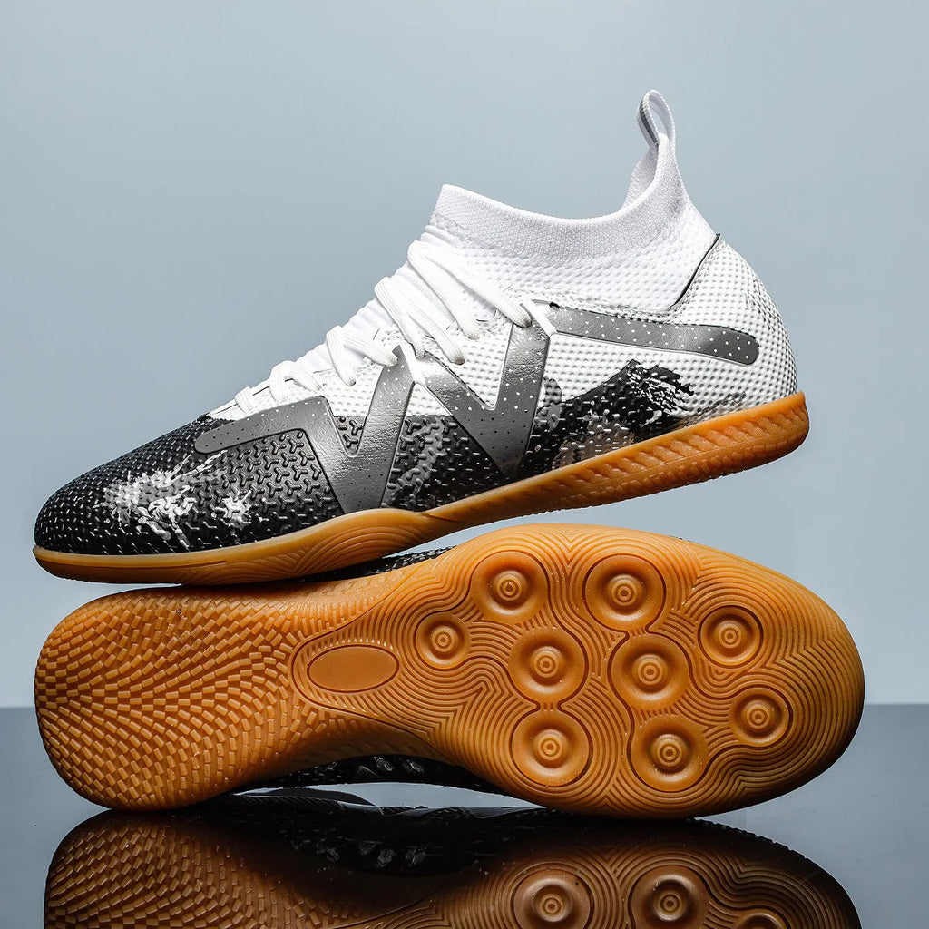 Adult football boots with non-slip rubber outsoles in black and yellow colourway