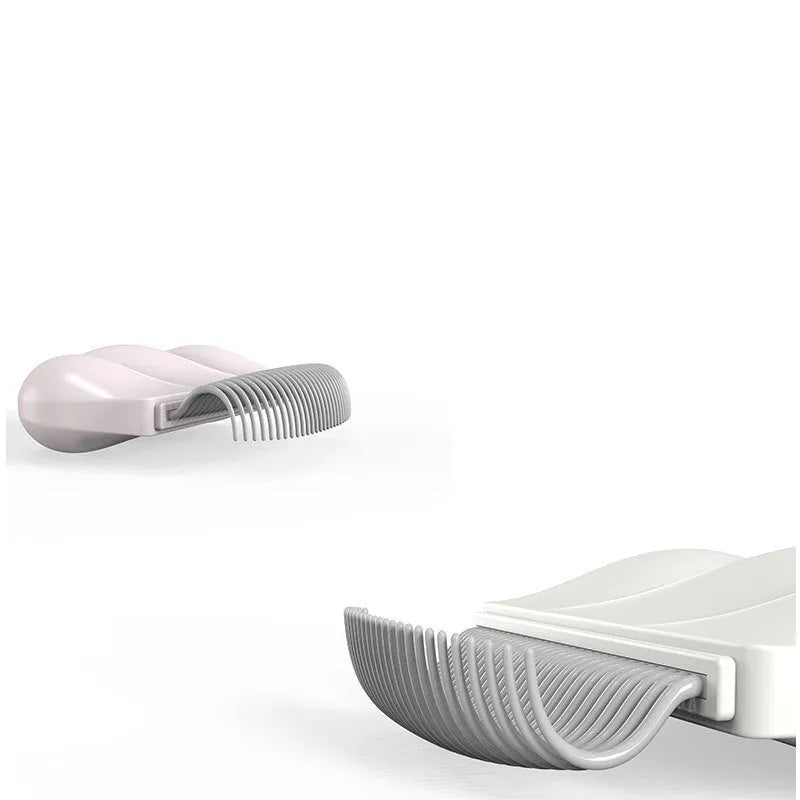 Blue Paw Soft deshedding brush for pets on a white background.