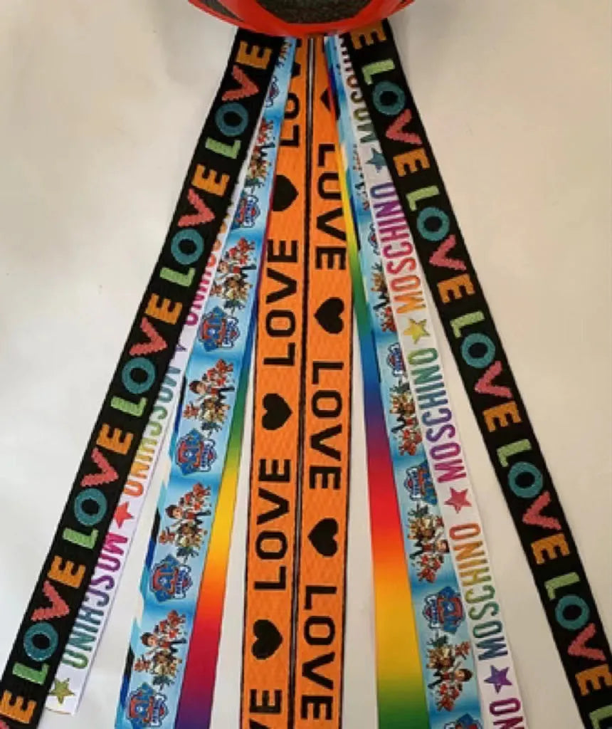 Decorative ribbon streamer for a child's ski or skating helmet in various colour options.