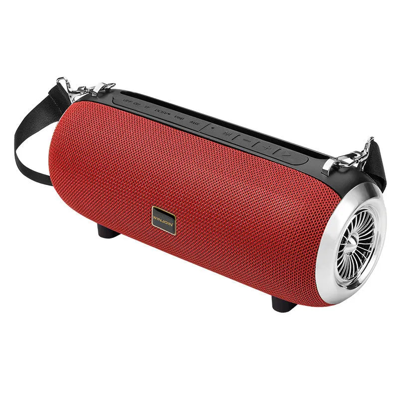 F666 square fabric portable Bluetooth speaker with shoulder strap on a table