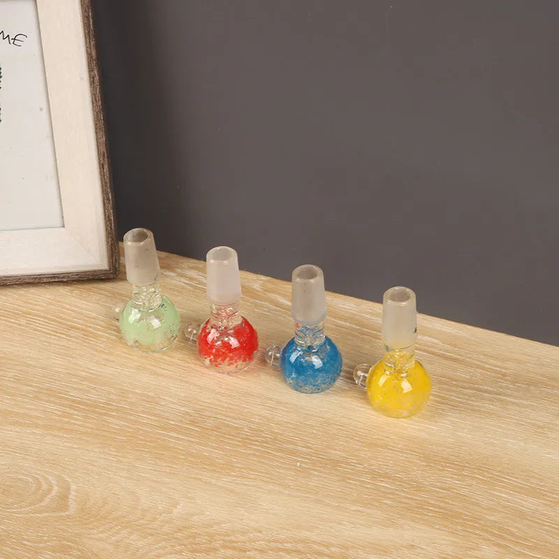 A 7cm transparent coloured glass trumpet-shaped tobacco pipe on a plain background.