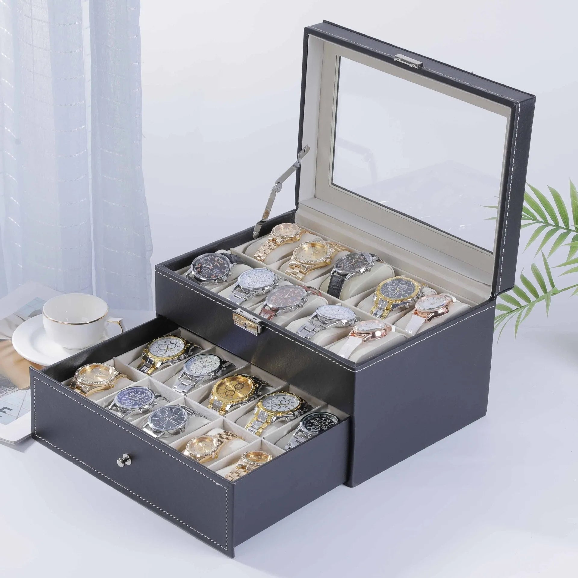 Leather watch storage box with clear dustproof lid showing multiple watch compartments