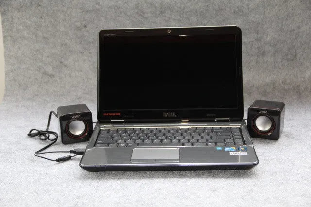Small black square USB-powered 2.0 computer speaker for desktop audio