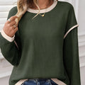 Drop shoulder loose top with four leaf clover contrast trim in polyester elastane fabric