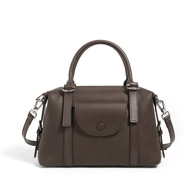 Genuine leather women's handbag with lock closure and single shoulder strap in street trend style