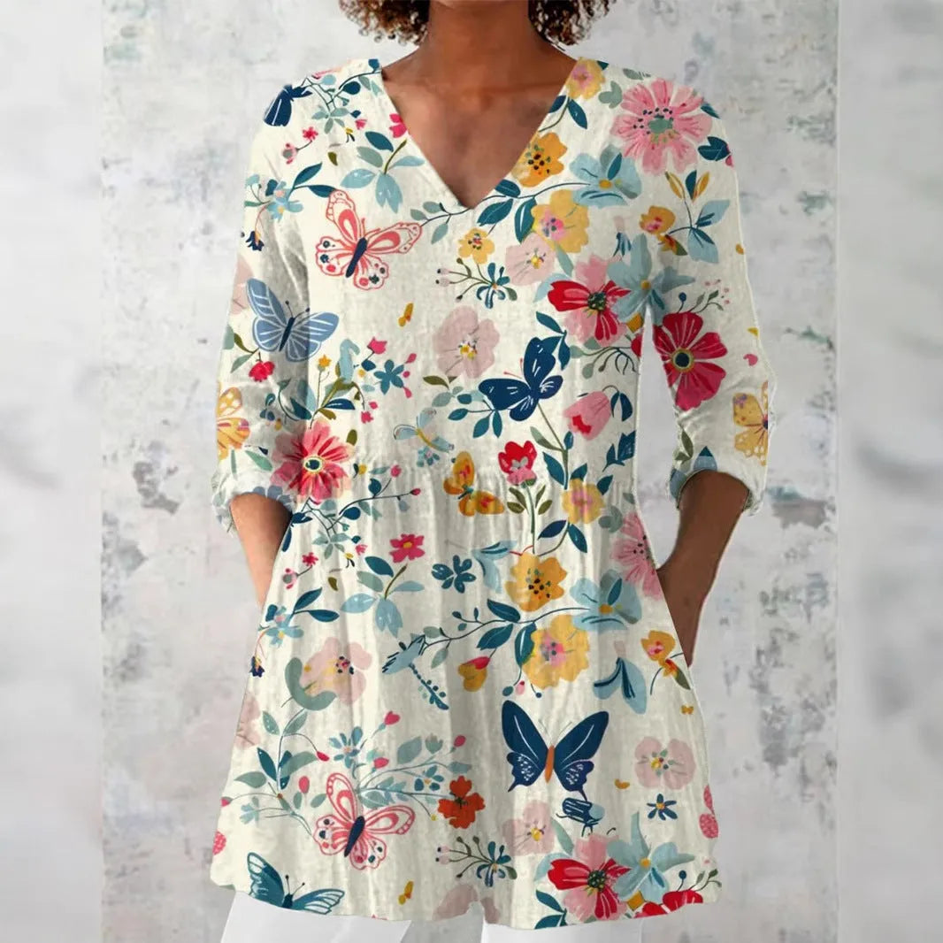 Women's retro style slim fit long sleeved top with a digital printed pattern.