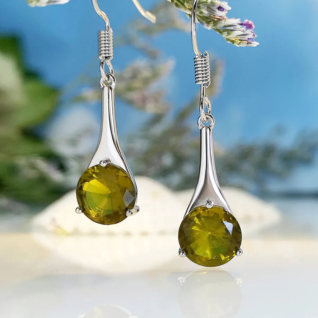 Olive green topaz drop earrings with water drop shape and gold electroplated finish