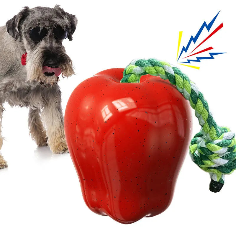 Green plastic dog molar toy with food dropping ball design for dental exercise