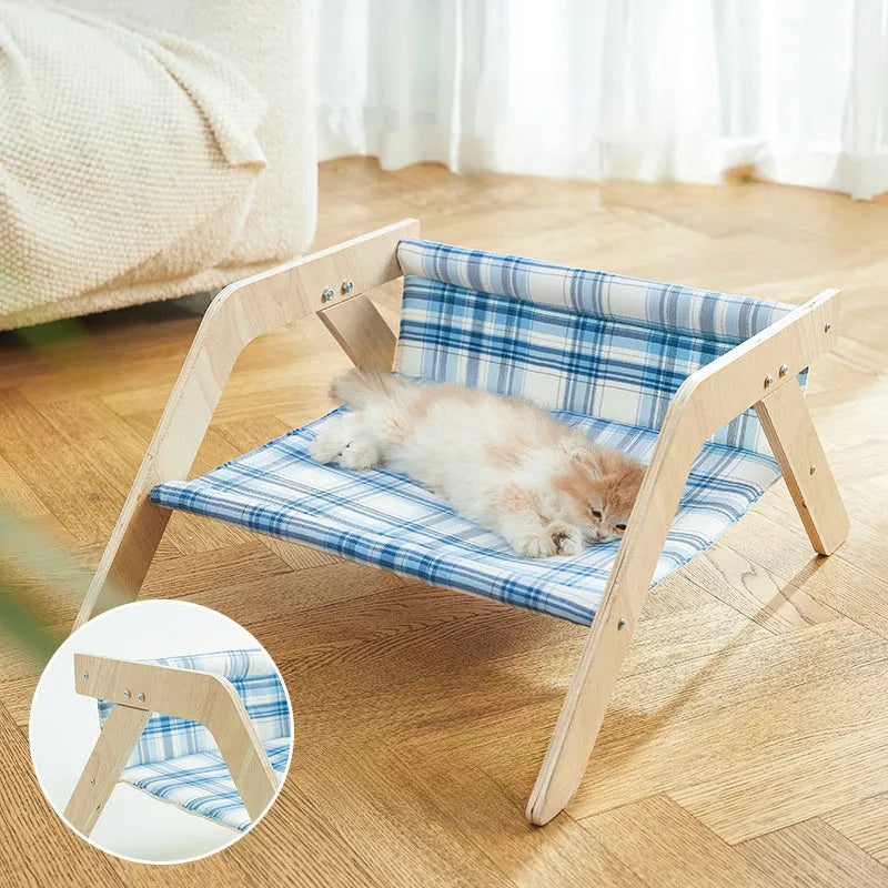 Wooden elevated cat bed with cloth hammock in beach chair design for indoor use