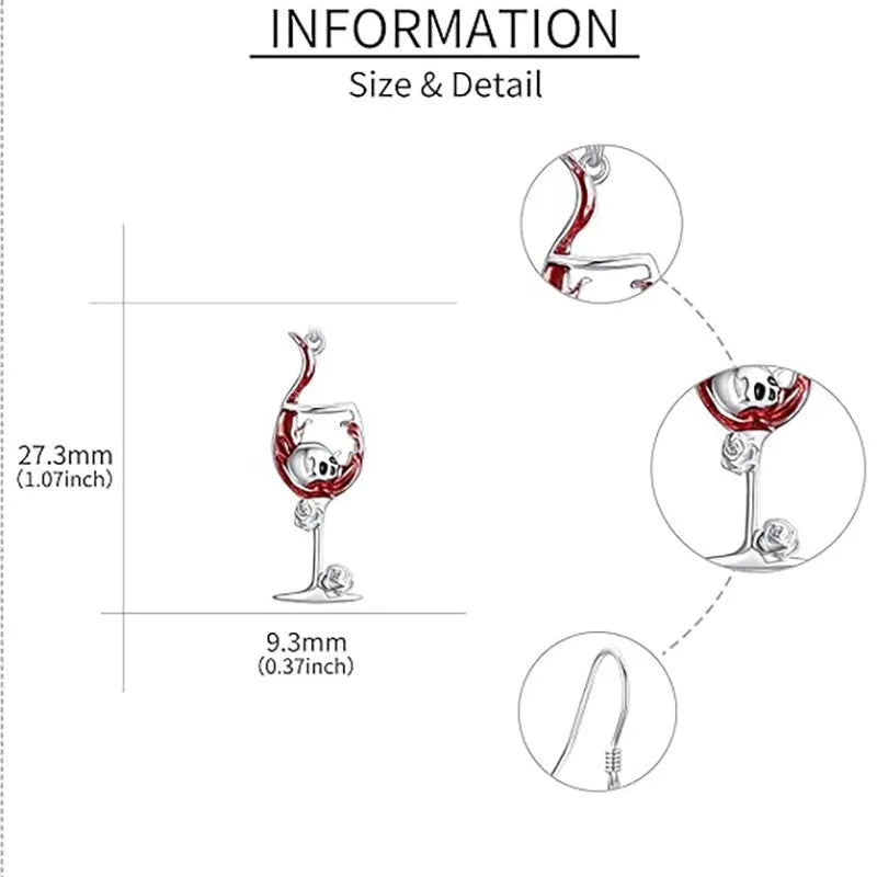 A pair of silver-toned Halloween earrings combining a skull design with a wine glass shape.