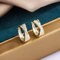 Geometric copper earrings with zircon treatment and 14K yellow finish
