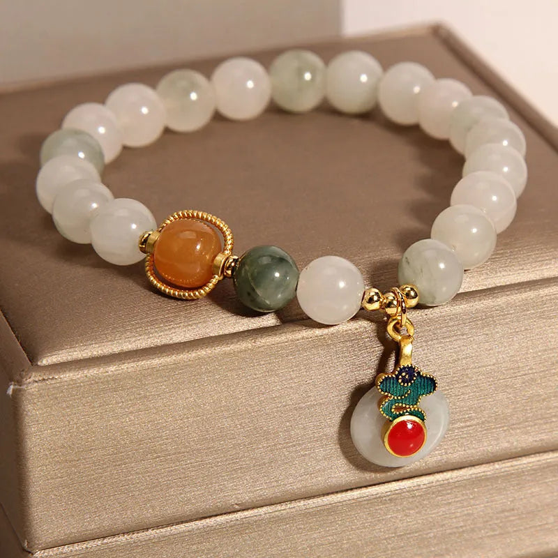 Ice jade women's bracelet with pearl accents and Xiangyun peace jade buckle design