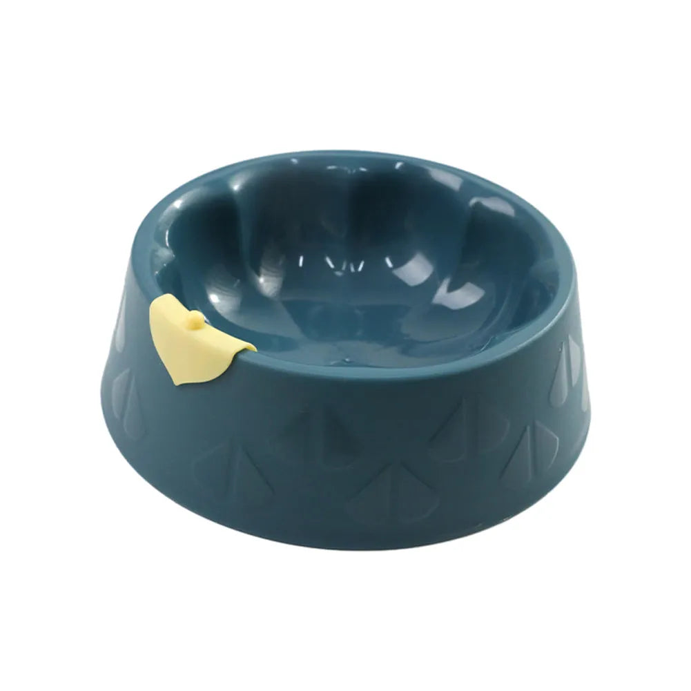 Green plastic double bowl for dog and cat food and water with anti-tip base.