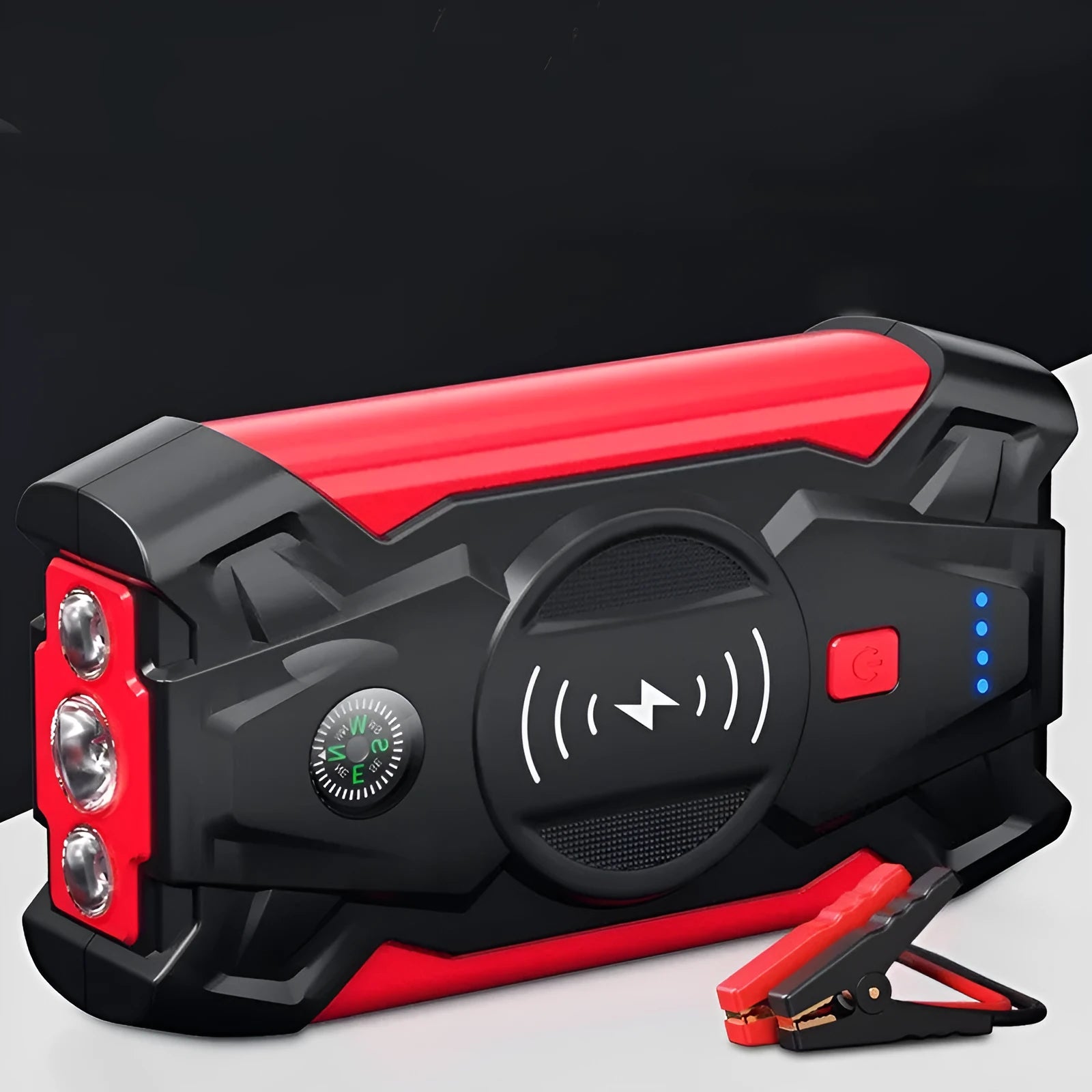 Red portable car emergency jump starter with digital display and thick clamps for 12V vehicle battery rescue