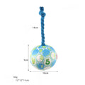 Elastic football design dog toy with cotton rope exterior and squeaker ball
