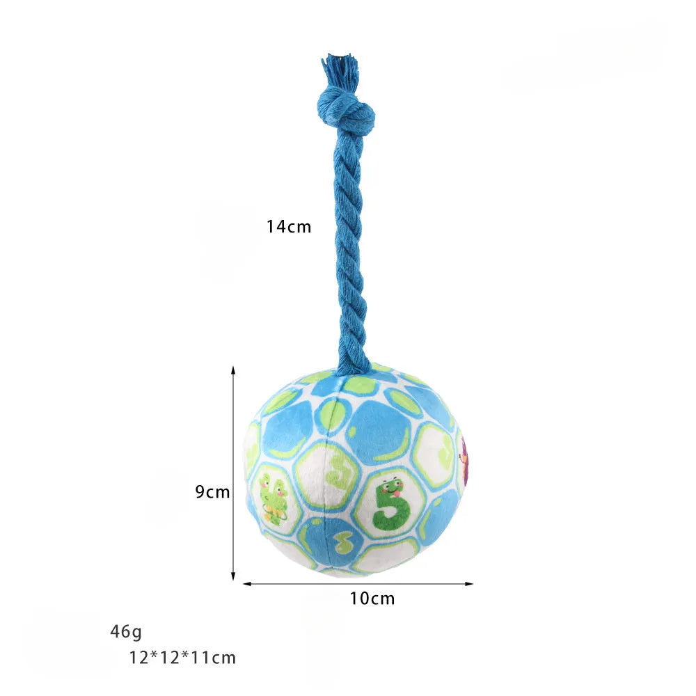 Elastic football design dog toy with cotton rope exterior and squeaker ball