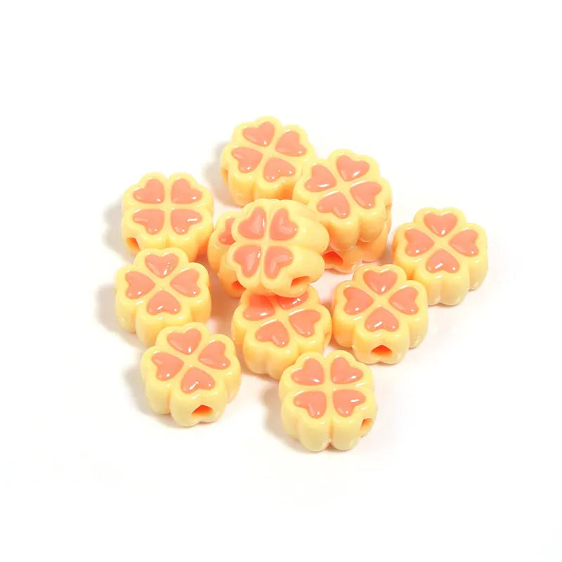 15mm acrylic four-leaf clover beads with frosted finish in various colours including rose red, pink, yellow, green, blue, purple