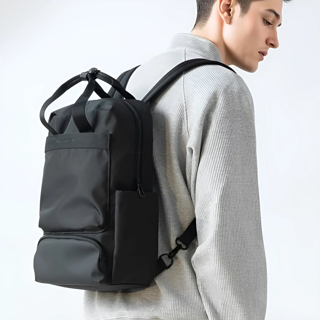 Black Oxford cloth computer backpack with 20-35L capacity and polyester lining
