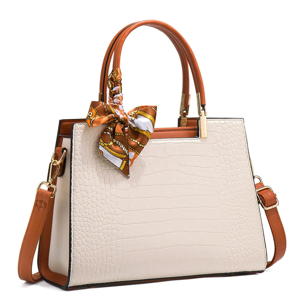 Milky white women's PU leather shoulder handbag with interior organisation pockets in horizontal square shape.