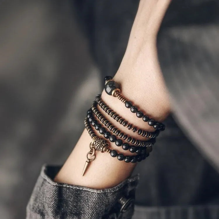 Black multi-layered bracelet with colourful geometric beads in retro design