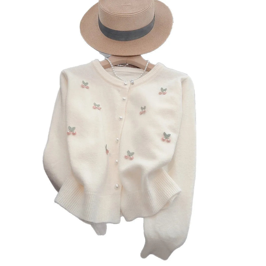 Pink cashmere-nylon cardigan coat with beaded details, round neck, and slim fit.