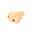 Flesh coloured plastic geometry design pencil sharpener with large casing, shown alongside a pencil.