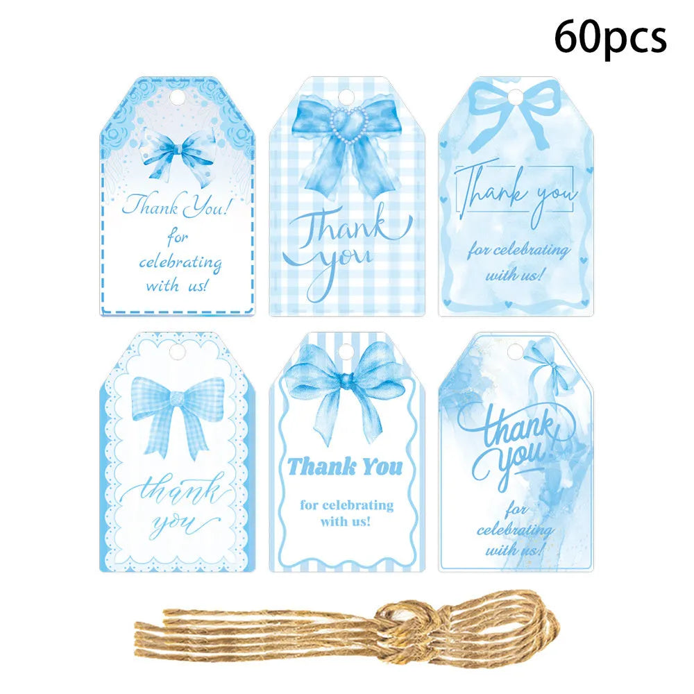 Set of 60 paper birthday gift tags with bowknot designs and natural hemp rope.