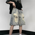 Blue retro-style denim shorts with a wide-leg loose fit and tattered detailing on a model.