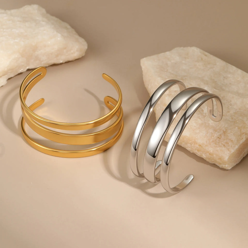 Gold electroplated stainless steel geometric line bracelet for women with a simple clasp.