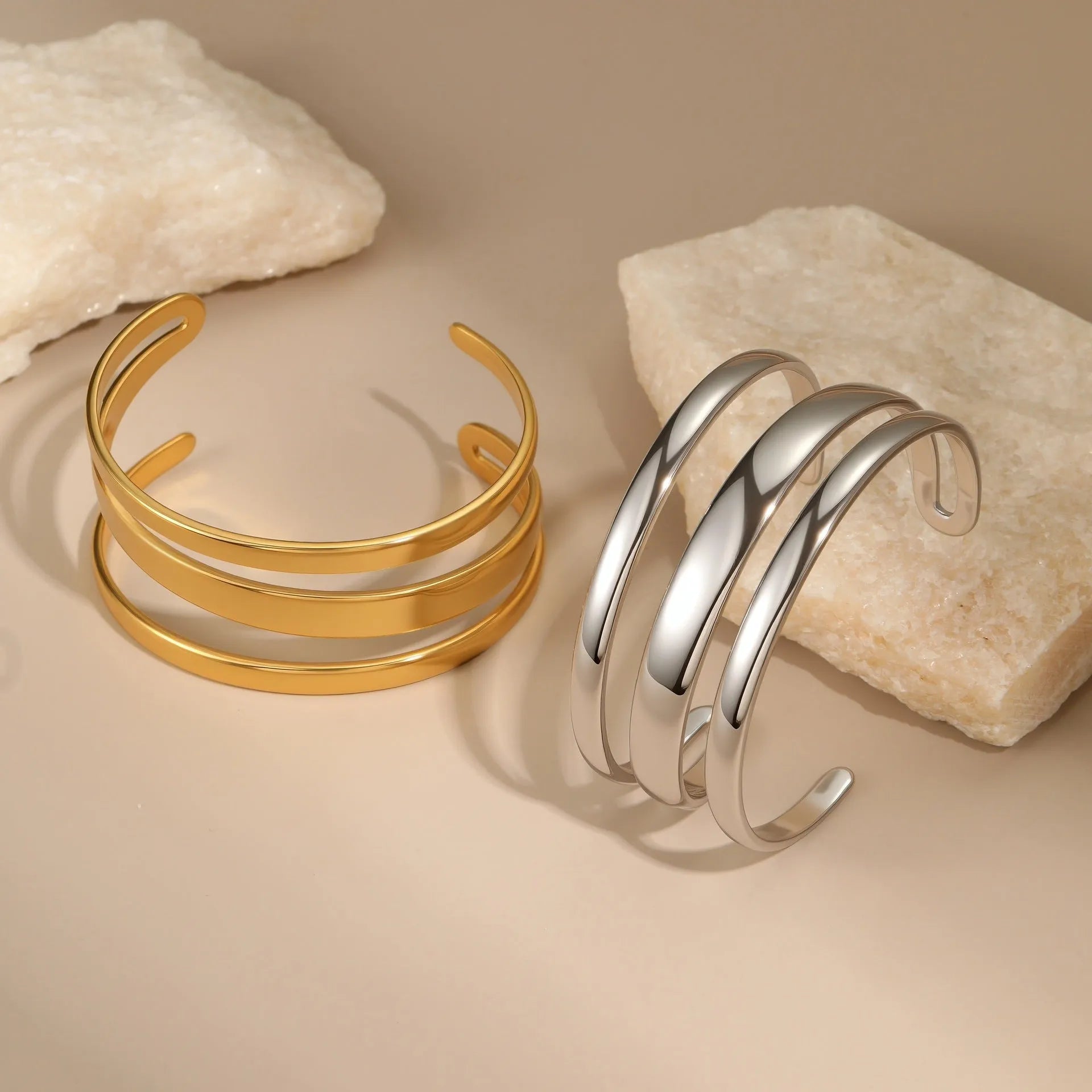 Gold electroplated stainless steel geometric line bracelet for women with a simple clasp.