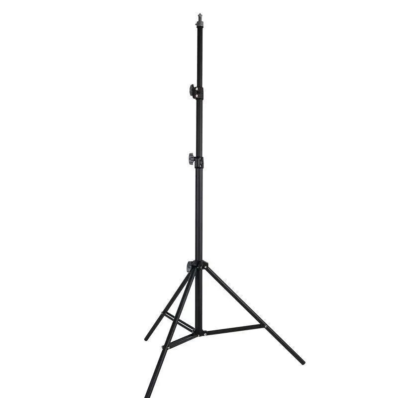 A 2.1 metre tall frosted silver tripod light stand with a mobile phone holder attached, on a studio floor.