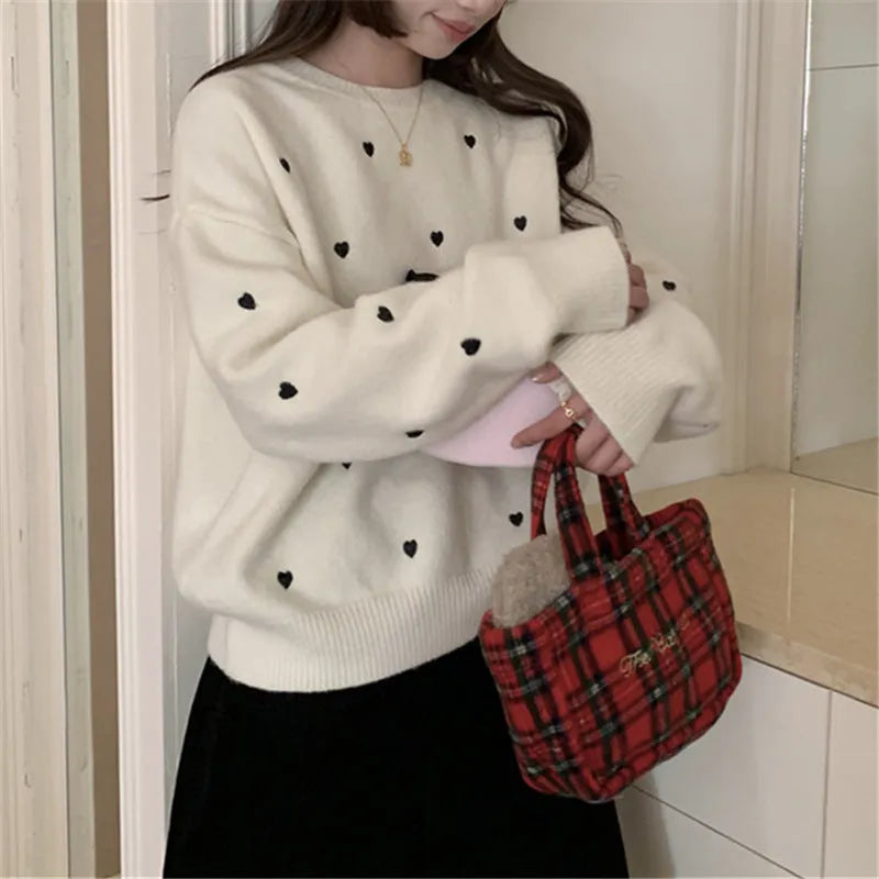 Women's loose-fitting acrylic pullover sweater with love embroidery in milky white, long sleeves, crew neck.