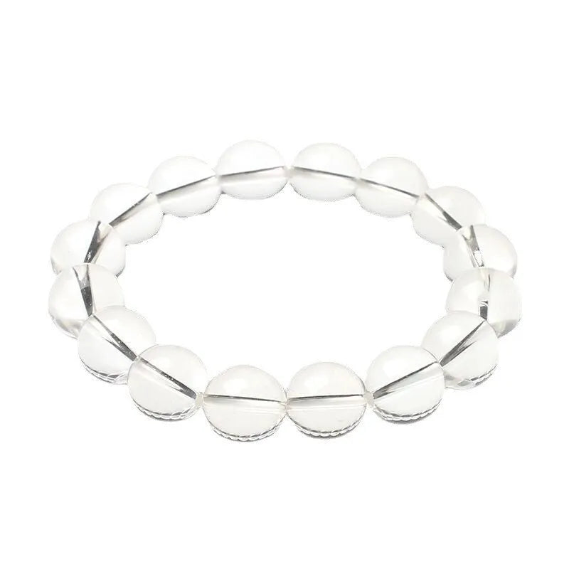 Natural Donghai white crystal bracelet with round water beads on a wrist, showing geometrical unisex design.